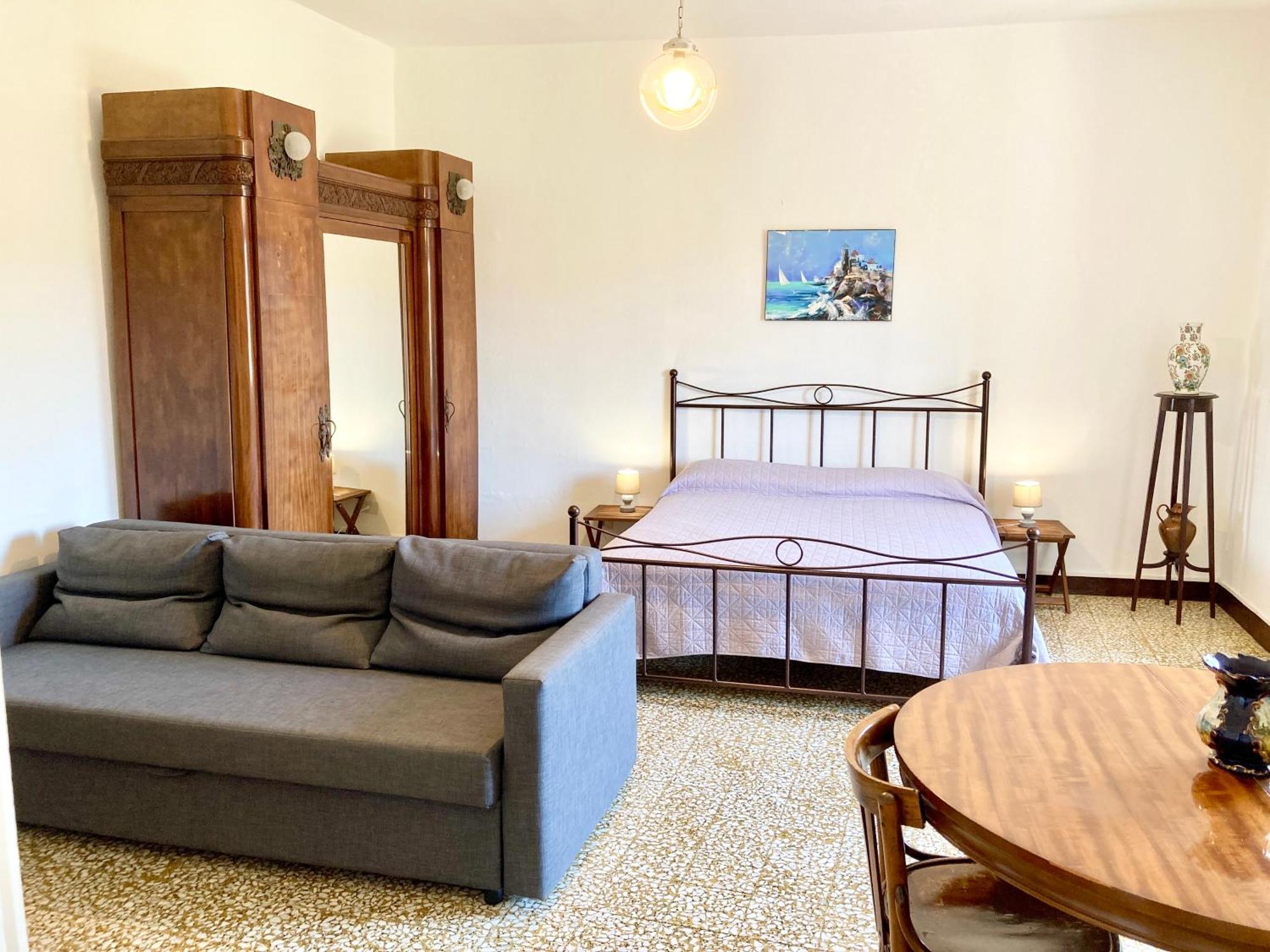 Ferienwohnung San Cerbone Porto Azzurro Zimmer foto